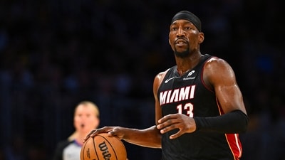 Miami Heat center/forward Bam Adebayo (13) moves the ball against the Los Angeles Lakers (IMAGN IMAGES via Reuters Connect)