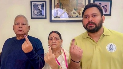 RJD's chief ministerial Tejashwi Yadav stepped out to cast his vote with his family. His father Lalu Prasad and mother Rabri Devi, both former Bihar chief ministers, showed their ink marked fingers after casting votes. (@yadavtejashwi) RJD's chief ministerial Tejashwi Yadav stepped out to cast his vote with his family. His father Lalu Prasad and mother Rabri Devi, both former Bihar chief ministers, showed their ink marked fingers after casting votes. (@yadavtejashwi)