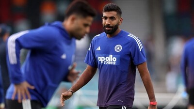 Jasprit Bumrah and Suryakumar Yadav warm up during the tour of Australia. (AFP) Jasprit Bumrah and Suryakumar Yadav warm up during the tour of Australia. (AFP)