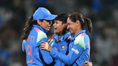 India's Kranti Goud (C) celebrates with Smriti Mandhana (L) and captain Harmanpreet Kaur (AFP) India's Kranti Goud (C) celebrates with Smriti Mandhana (L) and captain Harmanpreet Kaur (AFP)