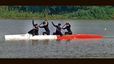Canoeists racing during the 27th Haryana State Canoeing Games 2025 at Sukhna Lake in Chandigarh on Thursday. (HT Photo)