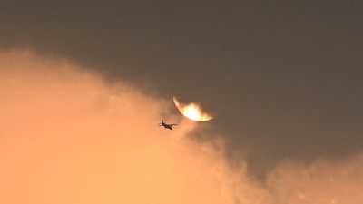 An airplane passes across the setting Sun in the evening sky on Wednesday, (RAJ K RAJ /HT PHOTO) An airplane passes across the setting Sun in the evening sky on Wednesday, (RAJ K RAJ /HT PHOTO)