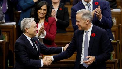 Minister of Finance Francois-Philippe Champagne shakes hands with Prime Minister Mark Carney at the conclusion of his speech after tabling the federal budget in the House of Commons on Parliament Hill in Ottawa, Ontario, Canada, on Tuesday. (REUTERS) Minister of Finance Francois-Philippe Champagne shakes hands with Prime Minister Mark Carney at the conclusion of his speech after tabling the federal budget in the House of Commons on Parliament Hill in Ottawa, Ontario, Canada, on Tuesday. (REUTERS)