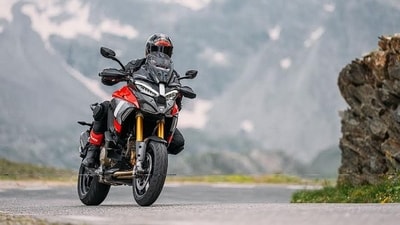 Ducati's Multistrada V4 Pikes Peak features a 1,158 cc V4 engine delivering 170 hp, optimized for agility and touring efficiency, with advanced electronics including Adaptive Cruise Control and a sophisticated suspension system. Ducati's Multistrada V4 Pikes Peak features a 1,158 cc V4 engine delivering 170 hp, optimized for agility and touring efficiency, with advanced electronics including Adaptive Cruise Control and a sophisticated suspension system.