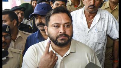 RJD leader Tejashwi Yadav was among the early voters in Patna on Thursday. (PTI) RJD leader Tejashwi Yadav was among the early voters in Patna on Thursday. (PTI)
