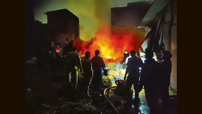 The godown in Manimajra’s Shastri Nagar reportedly stored jute bags and plastic bags, both of which were reduced to ashes in the blaze. Officials said an assessment of the total loss is underway. (HT Photo)
