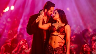 Ayushmann Khurrana and Rashmika Mandanna in a still from item number Poison Baby from Thamma. Ayushmann Khurrana and Rashmika Mandanna in a still from item number Poison Baby from Thamma.