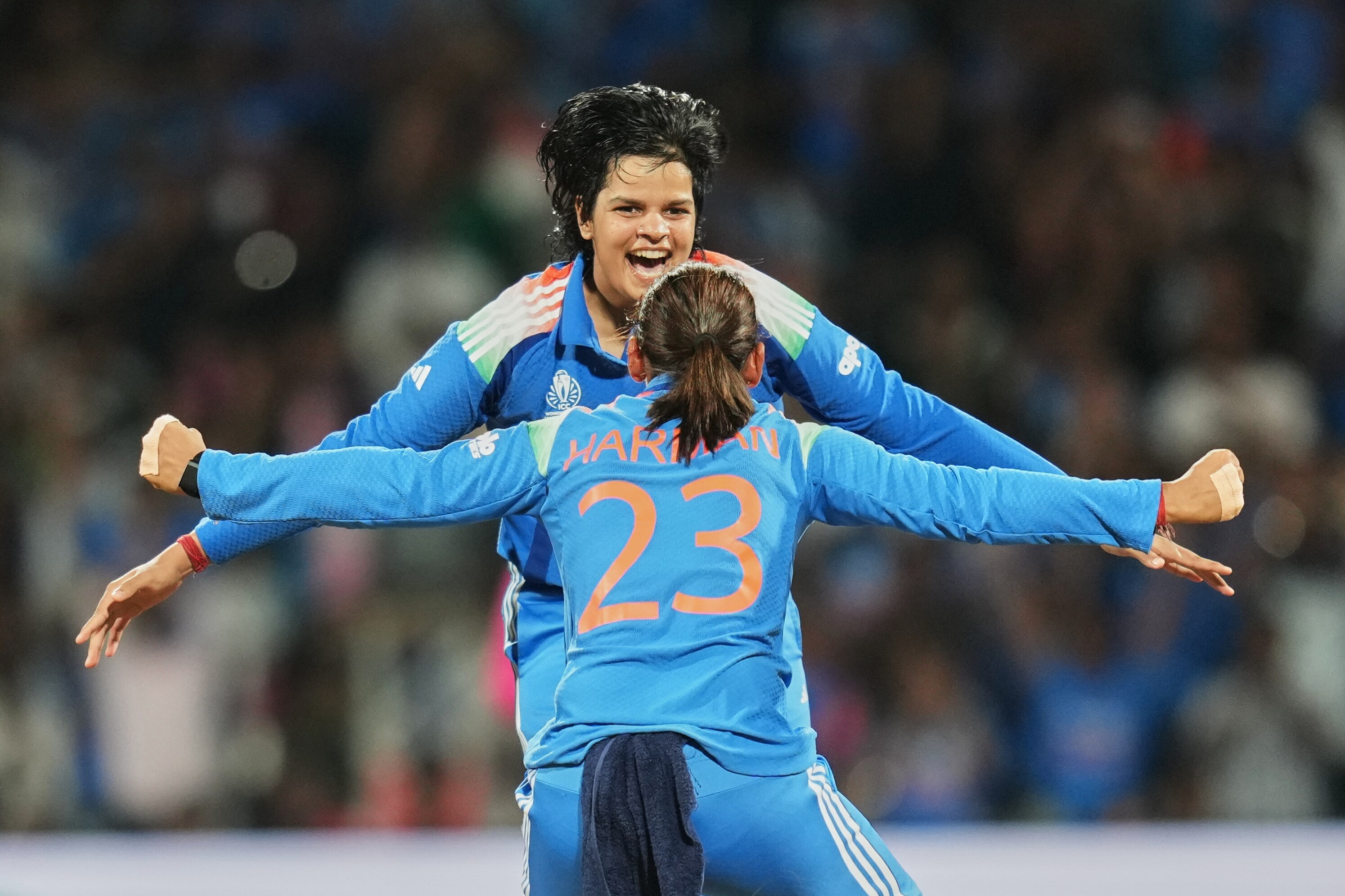 India captain Harmanpreet Kaur and Shafali Verma celebrate the dismissal of South Africa’s Sune Luus in Navi Mumbai on Sunday. (AP) India captain Harmanpreet Kaur and Shafali Verma celebrate the dismissal of South Africa’s Sune Luus in Navi Mumbai on Sunday. (AP)