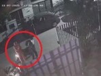 A CCTV grab of the two men, who fired over 30 rounds outside a house in Phase 7, Mohali, past Thursday midnight. (HT) A CCTV grab of the two men, who fired over 30 rounds outside a house in Phase 7, Mohali, past Thursday midnight. (HT)