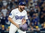 Alex Vesia #51 of the Los Angeles Dodgers reacts after the third out in the seventh inning against the Milwaukee Brewers 