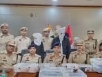 The arrested three in police custody on Friday. (HT Photo) The arrested three in police custody on Friday. (HT Photo)