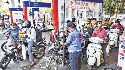 Motorcyclists wait in queues to get their vehicles filled with fuel, at a petrol pump in Navi Mumbai. (PTI file) Motorcyclists wait in queues to get their vehicles filled with fuel, at a petrol pump in Navi Mumbai. (PTI file)