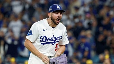 Alex Vesia #51 of the Los Angeles Dodgers reacts after the third out in the seventh inning against the Milwaukee Brewers (Getty Images via AFP) Alex Vesia #51 of the Los Angeles Dodgers reacts after the third out in the seventh inning against the Milwaukee Brewers (Getty Images via AFP)