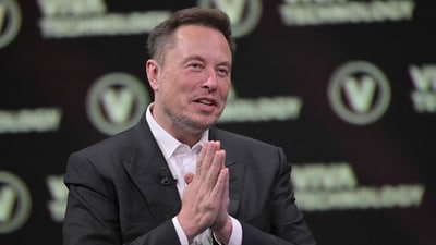 Elon Musk's new Tesla pay package will serve as a stock grant, providing him with 423.7 million additional shares. (AFP) Elon Musk's new Tesla pay package will serve as a stock grant, providing him with 423.7 million additional shares. (AFP)