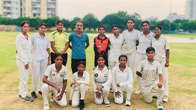 Head coach of the government school in Kadipur , Ajit Singh along with the players. (Parveen Kumar/HT) Head coach of the government school in Kadipur , Ajit Singh along with the players. (Parveen Kumar/HT)