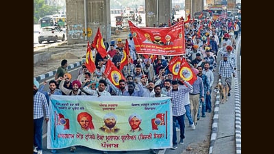 PSPCL outsourced employees holding a protest march in Ludhiana on Friday. (Gurpreet Singh/HT) PSPCL outsourced employees holding a protest march in Ludhiana on Friday. (Gurpreet Singh/HT)