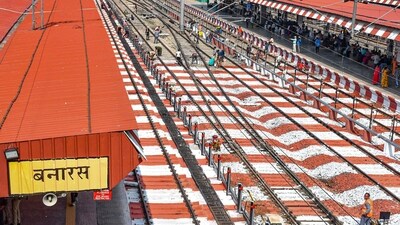 Workers paint the Varanasi railway station ahead of Prime Minister Narendra Modi's visit to the city, in Varanasi on November 5. (PTI) Workers paint the Varanasi railway station ahead of Prime Minister Narendra Modi's visit to the city, in Varanasi on November 5. (PTI)
