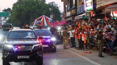 People welcome PM Narendra Modi’s convoy in Varanasi on Friday. (ANI PHOTO) People welcome PM Narendra Modi’s convoy in Varanasi on Friday. (ANI PHOTO)