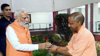 Prime Minister Narendra Modi being greeted by chief minister Yogi Adityanath in Varanasi on Friday. (ANI PHOTO) Prime Minister Narendra Modi being greeted by chief minister Yogi Adityanath in Varanasi on Friday. (ANI PHOTO)