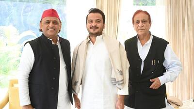 Samajwadi Party chief Akhilesh Yadav with veteran party leader Azam Khan and his son Abdullah Azam in Lucknow on Friday. (SOURCED)