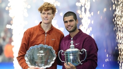 Carlos Alcaraz and Jannik Sinner pose with their trophies after the final of mens singles at the US Open 2025. (IMAGN IMAGES via Reuters Connect)