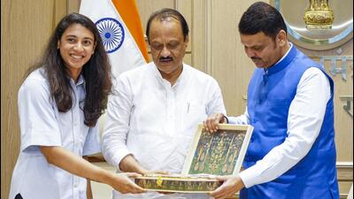 Team India vice-captain Smriti Mandhana being felicitated by CM Devendra Fadnavis and deputy CM Ajit Pawar on Friday. Other players and staff from the state were also honoured. (X/CMOMaharashtra) Team India vice-captain Smriti Mandhana being felicitated by CM Devendra Fadnavis and deputy CM Ajit Pawar on Friday. Other players and staff from the state were also honoured. (X/CMOMaharashtra)