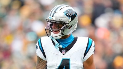 Tetairoa McMillan #4 of the Carolina Panthers reacts after a first down in the first quarter against the Green Bay Packers (Getty Images via AFP) Tetairoa McMillan #4 of the Carolina Panthers reacts after a first down in the first quarter against the Green Bay Packers (Getty Images via AFP)