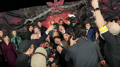 Ted Sarandos takes a selfie with the cast of Stranger Things. (Jordan Strauss/Invision/AP) Ted Sarandos takes a selfie with the cast of Stranger Things. (Jordan Strauss/Invision/AP)