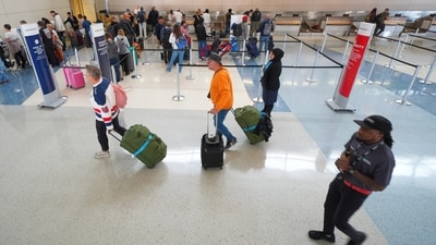 American Airlines cancelled 220 flights daily. (AP) American Airlines cancelled 220 flights daily. (AP)