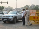 The incident took place around 5.30pm near the Tara Apartment crossing when flames suddenly erupted from the front portion of the vehicle as the woman waited for the light to turn green, her son seated beside her.