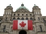A Canadian flag adorns British Columbia's provincial legislature building in Victoria, British Columbia, Canada October 3, 2025.