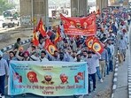 PSPCL outsourced employees holding a protest march in Ludhiana on Friday. (Gurpreet Singh/HT) PSPCL outsourced employees holding a protest march in Ludhiana on Friday. (Gurpreet Singh/HT)