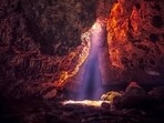The Mawmluh Cave’s narrow opening leads to a passage carved over 4,200 years — a subterranean archive of Earth’s memory, with vast chambers, narrow passages, and underground streams merging in rhythm. (Shutterstock) The Mawmluh Cave’s narrow opening leads to a passage carved over 4,200 years — a subterranean archive of Earth’s memory, with vast chambers, narrow passages, and underground streams merging in rhythm. (Shutterstock)