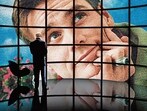 What else can a TV screen be? A still from The Truman Show (1998). What else can a TV screen be? A still from The Truman Show (1998).