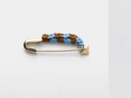 Prada turns a simple safety pin into a <span class='webrupee'>₹</span>69,000 statement piece Prada turns a simple safety pin into a <span class='webrupee'>₹</span>69,000 statement piece