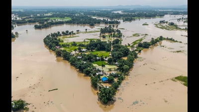 A village inundated following heavy rains in Golaghat, Assam, in September 2025. (PTI) A village inundated following heavy rains in Golaghat, Assam, in September 2025. (PTI)