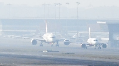 Aircraft waited for takeoff at Indira Gandhi International (IGI) Airport on Friday. Flight operations at the Delhi airport were delayed due to a technical glitch in the Air Traffic Control (ATC) system, which supports air traffic data. (Hindustan Times)