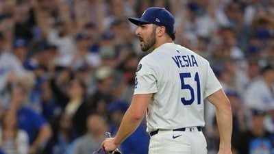 Los Angeles Dodgers pitcher Alex Vesia (51) reacts after a strike out in the eleventh inning against the Philadelphia Phillies (IMAGN IMAGES via Reuters Connect)