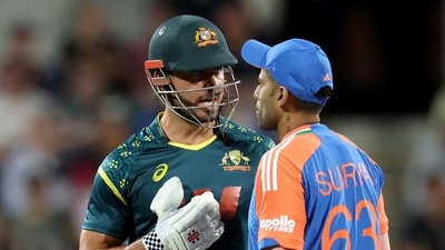 Australia's Marcus Stoinis (L) speaks with India's captain Suryakumar Yadav (AFP) Australia's Marcus Stoinis (L) speaks with India's captain Suryakumar Yadav (AFP)