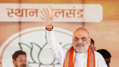 Union home minister Amit Shah waves to the crowd during the public rally organised for the Bihar assembly elections, in Madhubani on Monday. (@AmitShah X) Union home minister Amit Shah waves to the crowd during the public rally organised for the Bihar assembly elections, in Madhubani on Monday. (@AmitShah X)