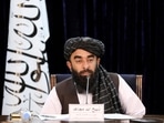 FILE PHOTO: Taliban spokesman Zabihullah Mujahid speaks during a news conference in Kabul, Afghanistan November 10, 2021. REUTERS/Ali Khara/File Photo
