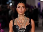 Kim Kardashian poses for photographers upon arrival at the premiere of the television series "All's Fair" on Wednesday, Oct. 22, 2025, in London. (Photo by Scott A Garfitt/Invision/AP)