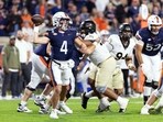 Chandler Morris #4 of the Virginia Cavaliers throws a pass in the first half during a game against the Wake Forest Demon Deacons 