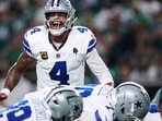 Dallas Cowboys' Dak Prescott (4) signals at the line of scrimmage in the first half vs Philadelphia Eagles Dallas Cowboys' Dak Prescott (4) signals at the line of scrimmage in the first half vs Philadelphia Eagles