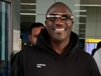 Akon flashed a smile as he spotted the paparazzi at Delhi airport. Akon flashed a smile as he spotted the paparazzi at Delhi airport.