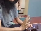 Screengrab of the video showing Zuhaib Manna (L) and Umesh Reddy (R). Screengrab of the video showing Zuhaib Manna (L) and Umesh Reddy (R).
