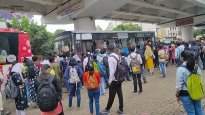 At several busy bus stops, passengers are still forced to wait under the open sky or take shelter under nearby trees or shops during heavy rains and scorching heat. (HT)