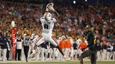 Cam Coleman #8 of the Auburn Tigers catches a pass in front of LeVar Thornton Jr. #25 of the Baylor Bears (Getty Images via AFP) Cam Coleman #8 of the Auburn Tigers catches a pass in front of LeVar Thornton Jr. #25 of the Baylor Bears (Getty Images via AFP)