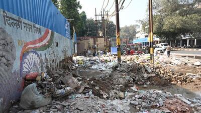 Construction waste dumped in open at a designated site, without proper barricades. (Arvind Yadav/HT Photo) Construction waste dumped in open at a designated site, without proper barricades. (Arvind Yadav/HT Photo)
