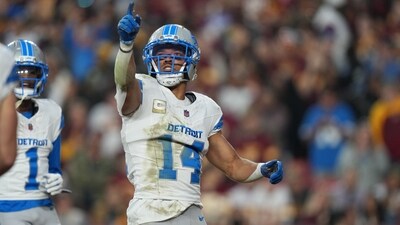 Detroit Lions wide receiver Amon-Ra St. Brown celebrates after scoring during the first half of the game against the Washington Commanders (AP)